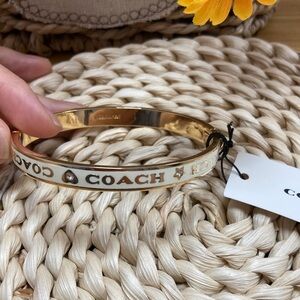 Coach Gold-Tone Logo Hinged Bangle Bracelet